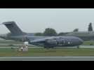Plane carrying Queen Elizabeth II's coffin arrives in London
