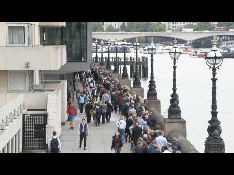 People queue in London to pay their respects at the Queen's coffin