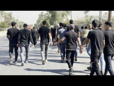 Sadr supporters march towards Iraq's Green Zone following politics exit