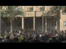 Protesters storm government palace after Iraq's Shiite cleric Sadr says quitting politics
