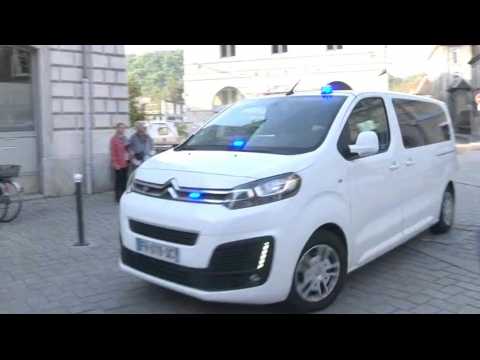 Van carrying Chilean accused of murdering Japanese ex-lover arrives in court