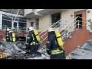 Firefighters pull residents out of destroyed apartment building in Odessa