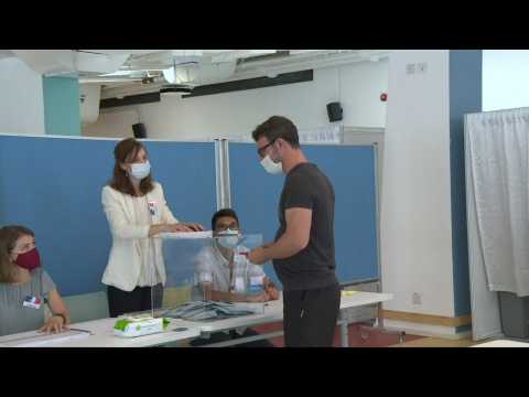 French expatriates in Hong Kong vote in second round of presidential election
