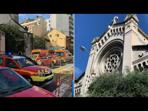 Police and firemen on the scene after the attack on a priest in Nice