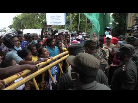 Anger in Sri Lanka as people block roads after waiting in overnight queues for gas