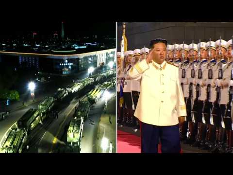 North Korea broadcasts military parade, Kim salutes soldiers