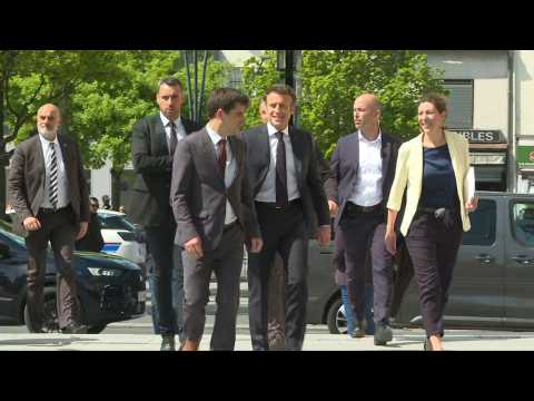 French elections: Emmanuel Macron campaigns on outskirts of Paris
