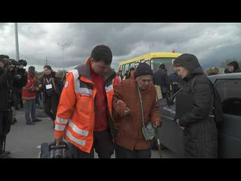 Mariupol evacuees arrive by bus in south-eastern Ukraine