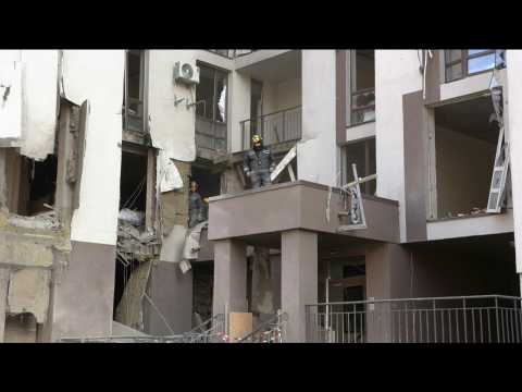 Images of damaged buildings after overnight strikes in Kyiv