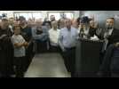 Mourners pay their respects during funeral of Israeli killed in Palestinian attack