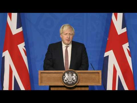 UK 'will not be cowed by terrorism' says PM after taxi blast