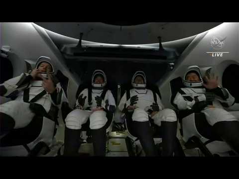 ISS astronauts exit SpaceX craft after return to Earth