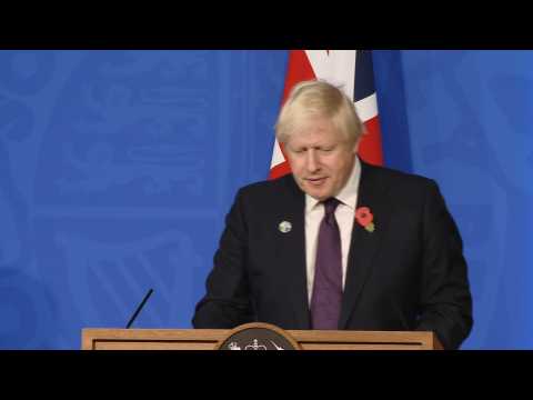 UK PM says COP deal 'tinged with disappointment'