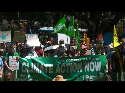 Hundreds of people rally over climate change in Sydney