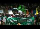Hundreds of people rally over climate change in Sydney