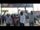 Anti-military protestors block roads and gather in streets of Khartoum