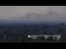 Smoke rises over the front line in Donbass region