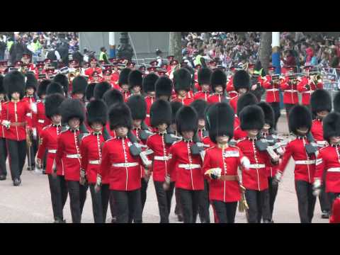 Soldiers parade down the Mall in London to mark last day of Jubilee celebrations