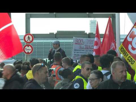 Airport staff in Paris strike to demand higher wages