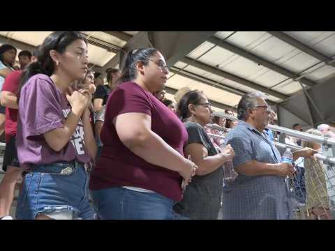 People attend prayer vigil in Uvalde, Texas, after elementary school shooting