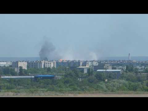 Smoke rises over Severodonetsk as war in east Ukraine at 'maximum intensity'