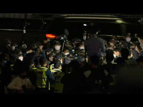 Anti-Biden protesters scuffle with police near US president's hotel