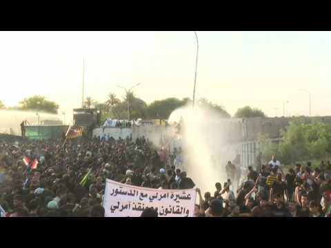 Water cannons fired during anti-Sadr protest near occupied parliament