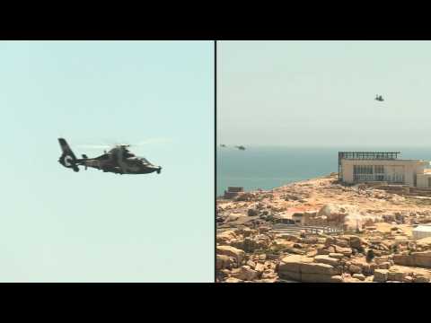 Chinese military helicopters fly near Taiwan strait