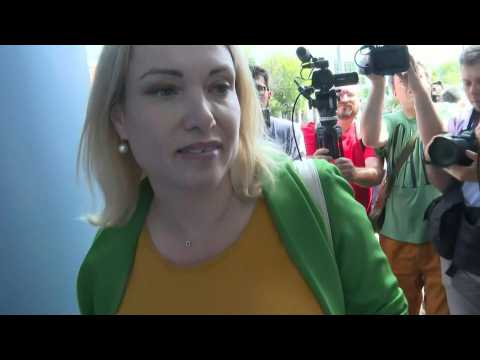 Russian journalist arrives for first court hearing, accused of 'discrediting' the army