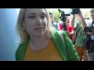 Russian journalist arrives for first court hearing, accused of 'discrediting' the army