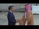 Macron greets visiting Saudi crown prince with handshake