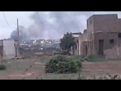 Gunfire and smoke at Mali army depot during 'suicide' attack