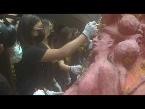 Tiananmen anniversary: Hong Kong university students clean the 'Pillar of Shame'