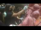 Tiananmen anniversary: Hong Kong university students clean the 'Pillar of Shame'