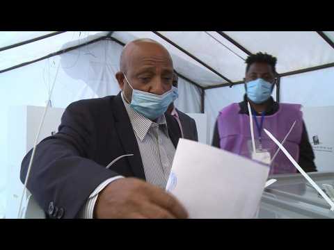 Ethiopian opposition leader Berhanu Nega votes in elections