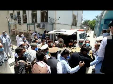 Bodies arrive at morgue after Afghan polio vaccinators shot dead