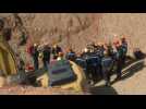 Moroccan rescuers gather as efforts to free boy stuck in well progress