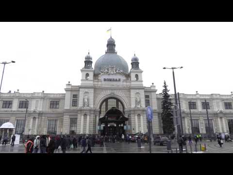 People at Lviv train station wait to depart Ukraine