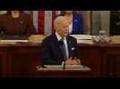 Biden says 'we never will just accept living with Covid'