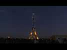 Paris shines Ukranian flag colours on Eiffel Tower