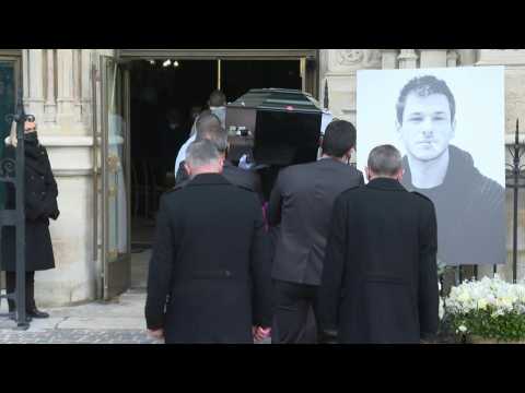 Pallbearers carry coffin of French actor killed in skiing accident