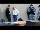 Navalny faces extra decade in jail as prison trial begins