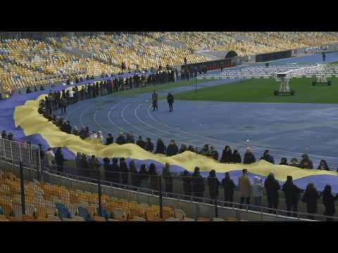 Ukrainians deploy giant national flag to mark 'Unity Day'