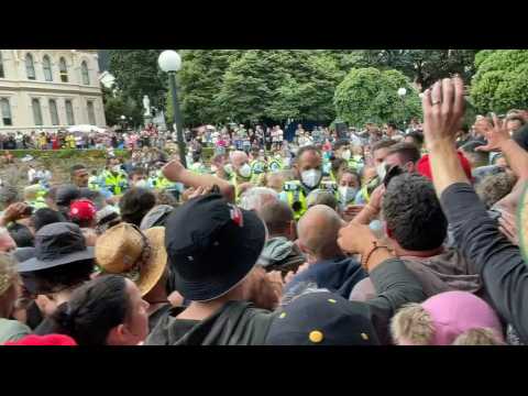 Anti-vaccine protesters confront police outside New Zealand's parliament