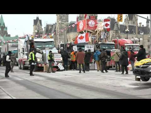 Canadian police hand leaflets ordering Ottawa protesters to leave