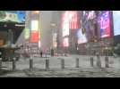 Snow falls on New York City's Times Square