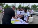 Tennis: activists hand out "Where is Peng Shuai?" t-shirts outside Melbourne Park
