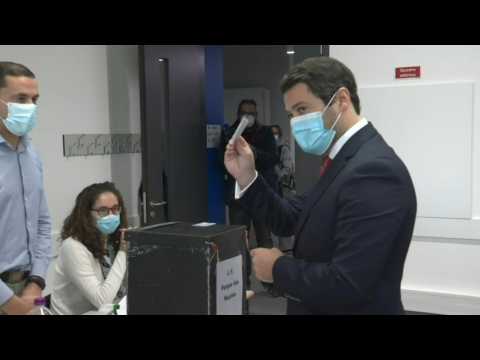 Portugal election: far-right Chega party leader Andre Ventura casts his vote
