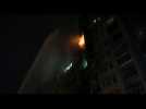 Ukraine: firefighters on scene after Kyiv residential building shelled