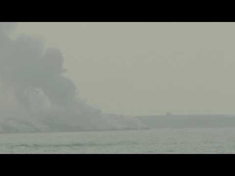 Lava from Canary Islands volcano falls into ocean